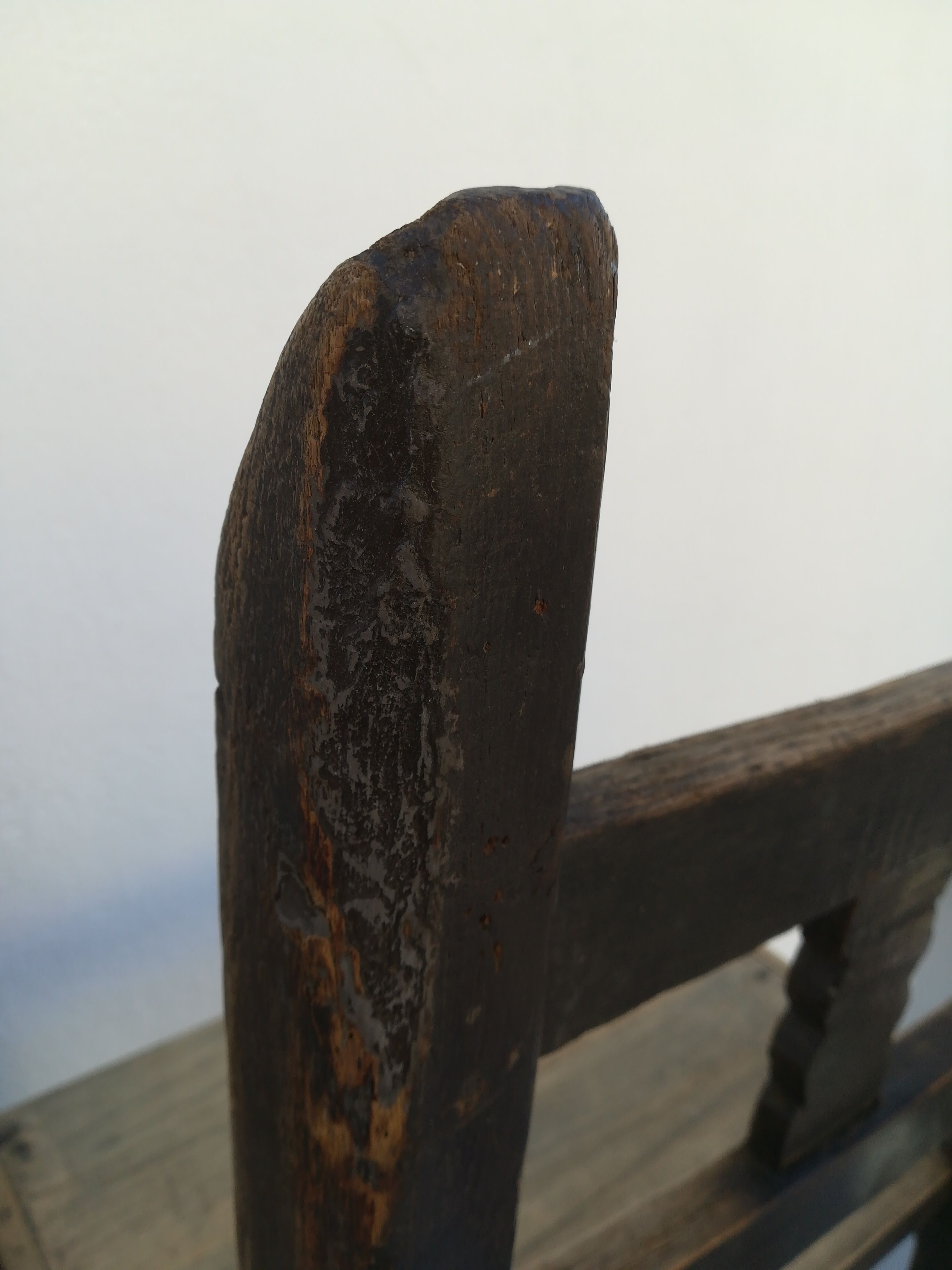 Pair of ethnic crude wooden chairs