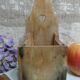 Vintage wooden salt box with spoon