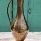 Carafe vase in chiseled brass