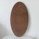 Oval antique mirror in solid wood from the 1960s.