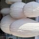Large round pink Japanese-style suspension made of rattan and natural linen D60.