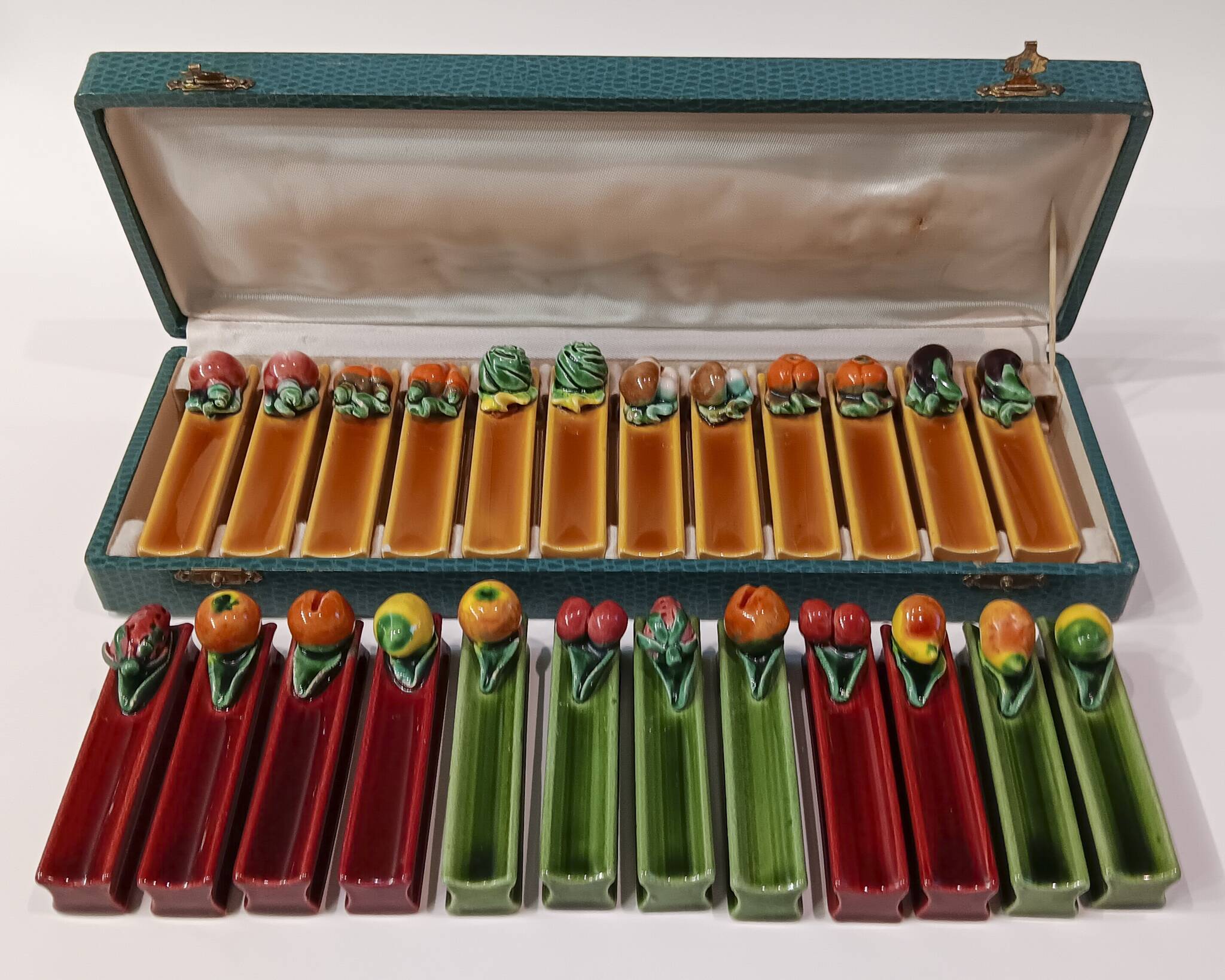 24 vintage Majolica Vallauris ceramic knife holders.