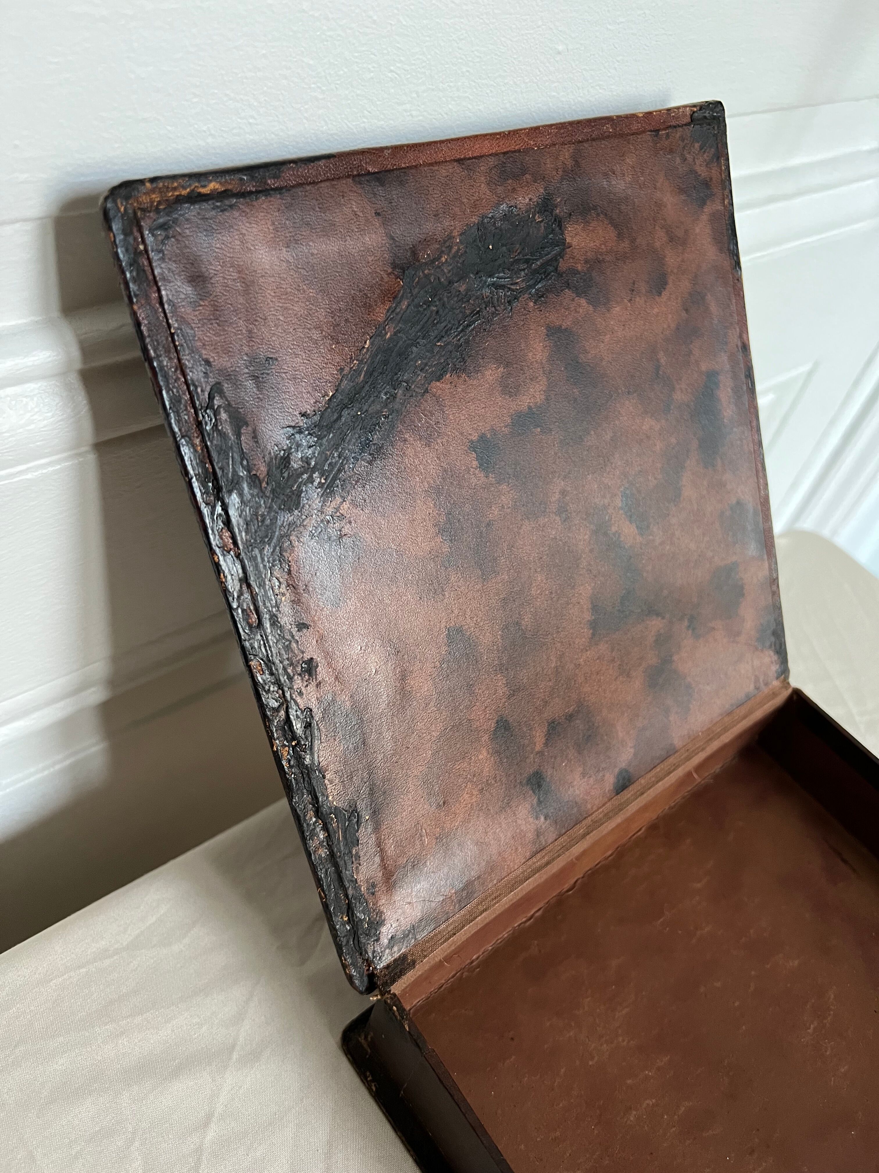 Wooden jewelry box and leather top with patterns