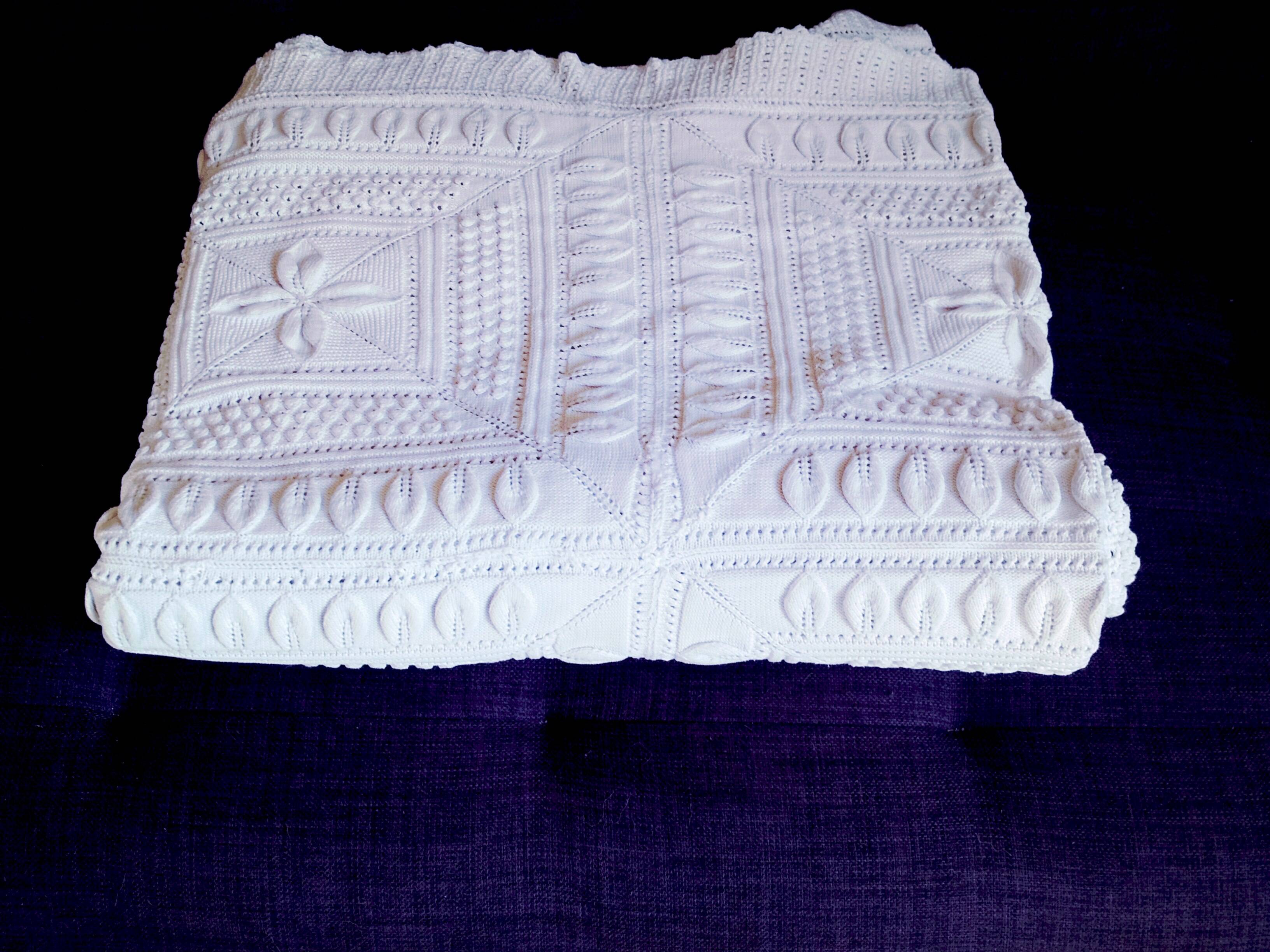 Knitted white cotton bedspread