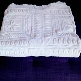 Knitted white cotton bedspread