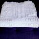 Knitted white cotton bedspread