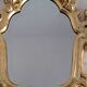 Miroir en bois et doré à la feuille doré