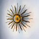 Brutalist sunburst ceiling light – gilt iron rays & exposed bulb, France, 1960s