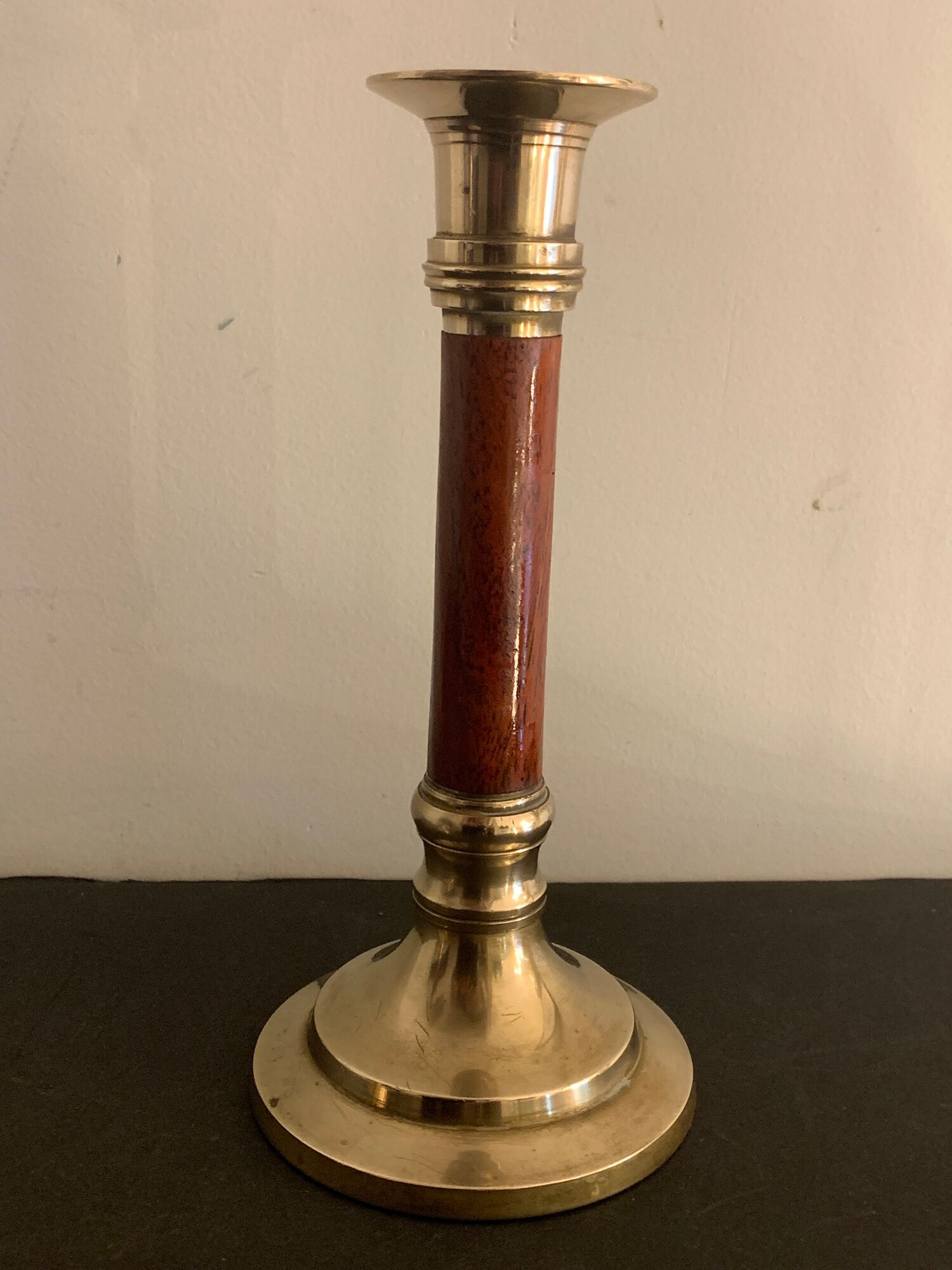 Pair of brass and mahogany wood candle holders