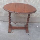 Coffee table with drop-leaf doors