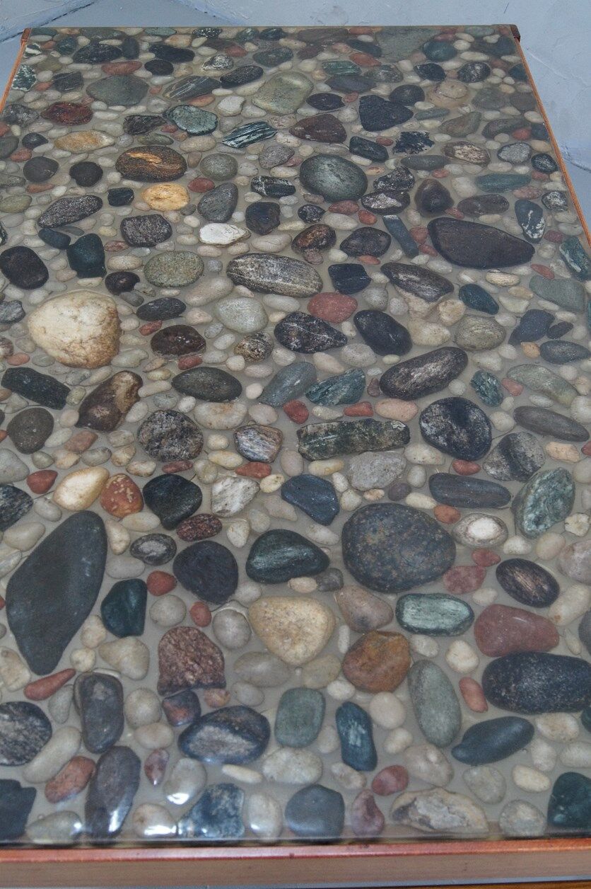Swedish rosewood and pebbles coffee table in the style of Ib Kofod-Larsen , 1960s