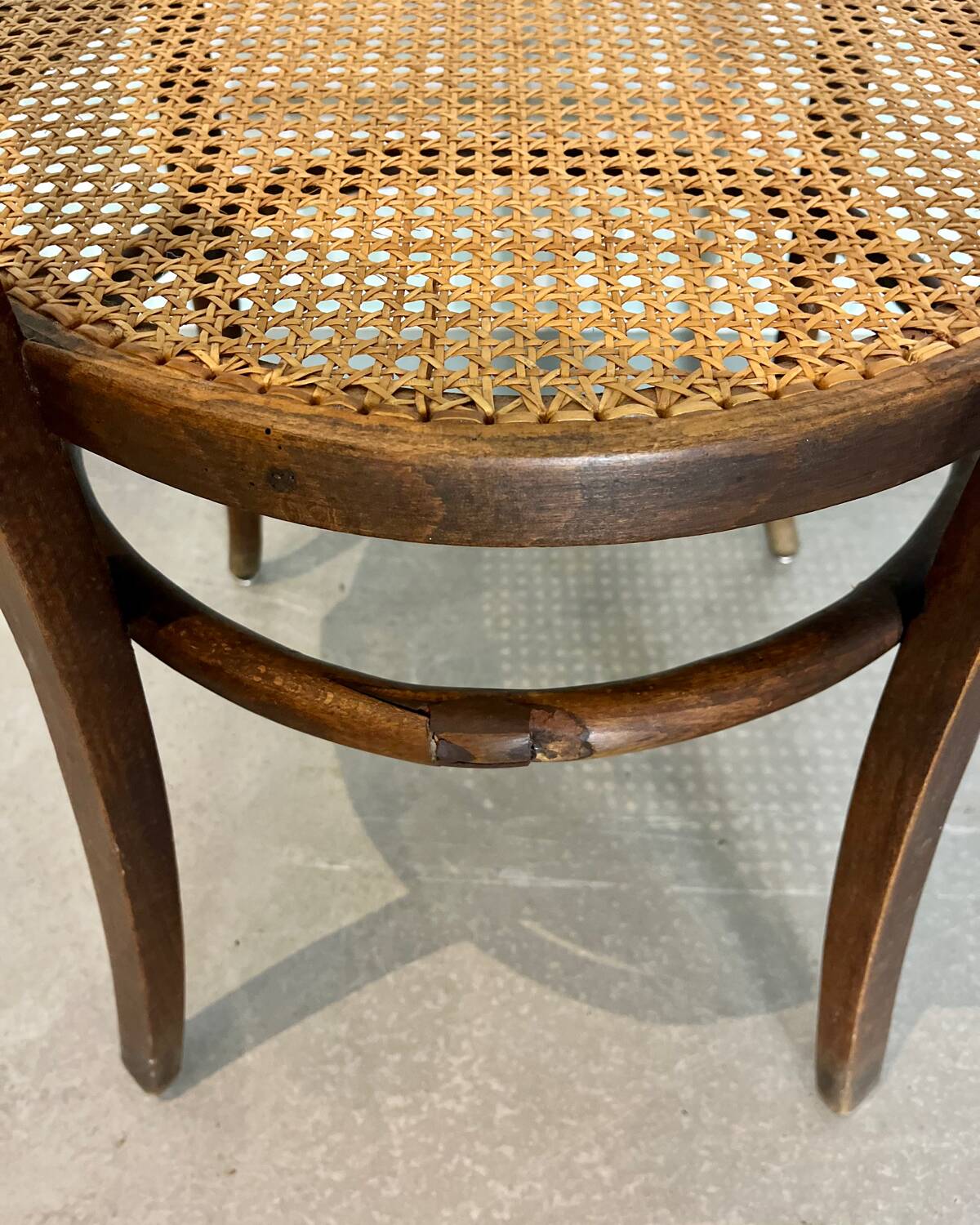 Baumann armchair in curved wood and canework