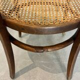 Baumann armchair in curved wood and canework