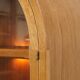 Elegant vintage Danish display cabinet with glass panels and atmospheric lighting