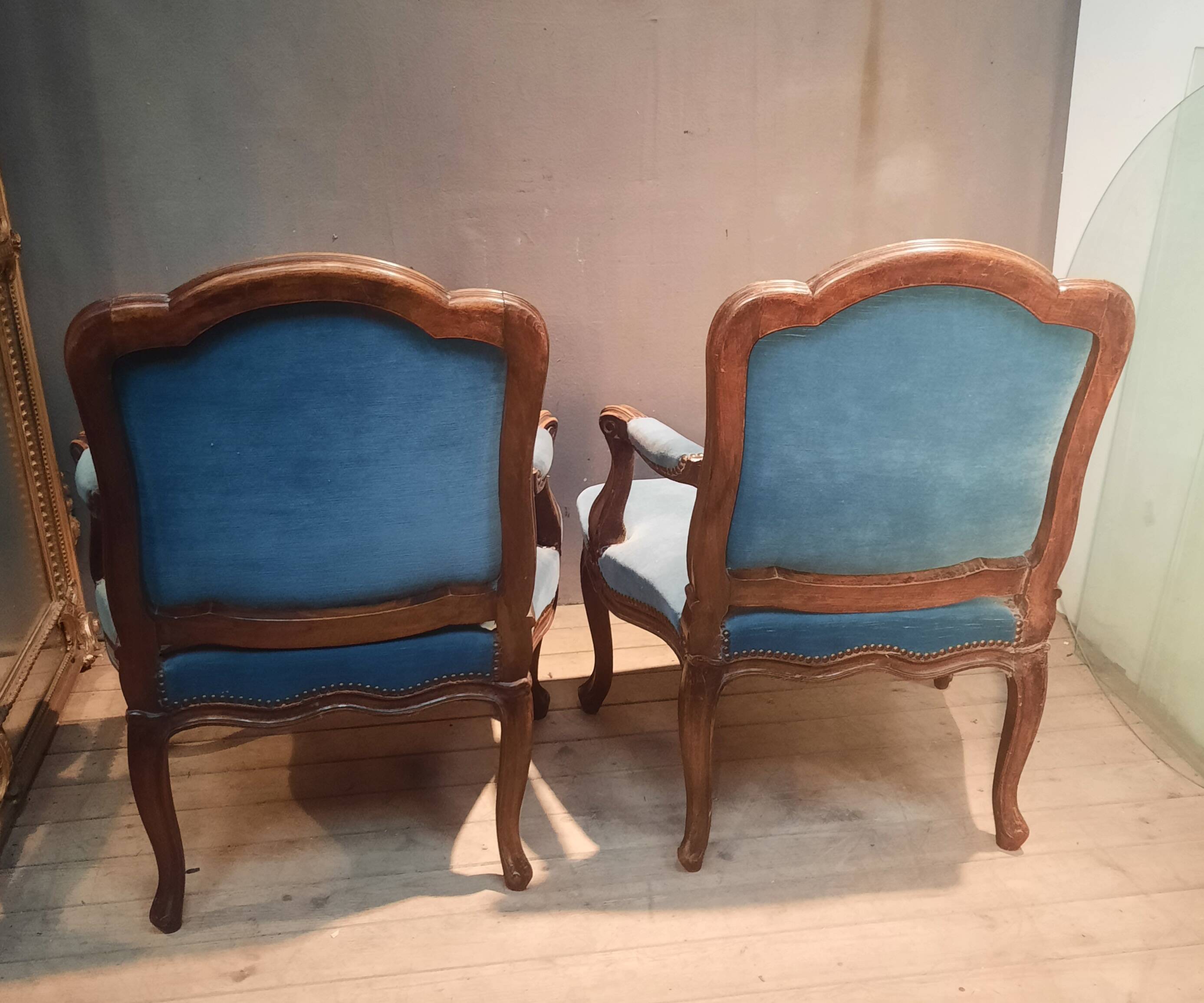 Pair of large armchairs in Louis XV style from the 19th century.