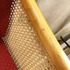 Vintage wooden and cane armchair – 1980s
