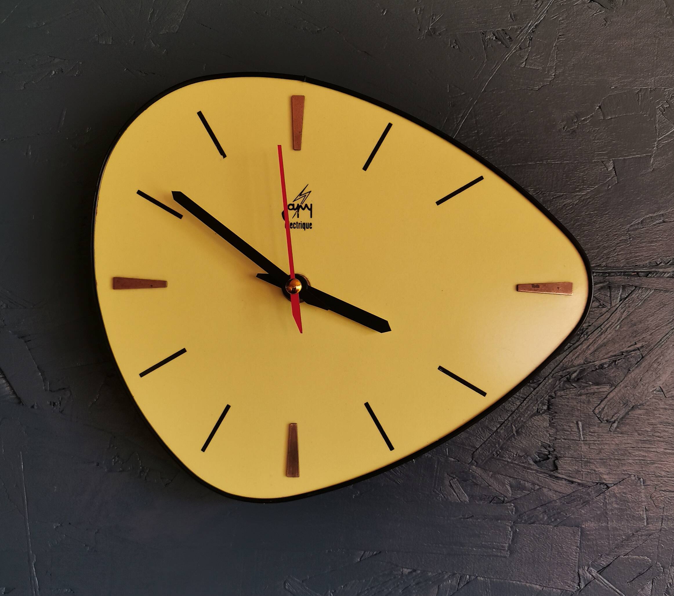 Vintage Formica clock silent asymmetrical wall pendulum "Yellow Japy"