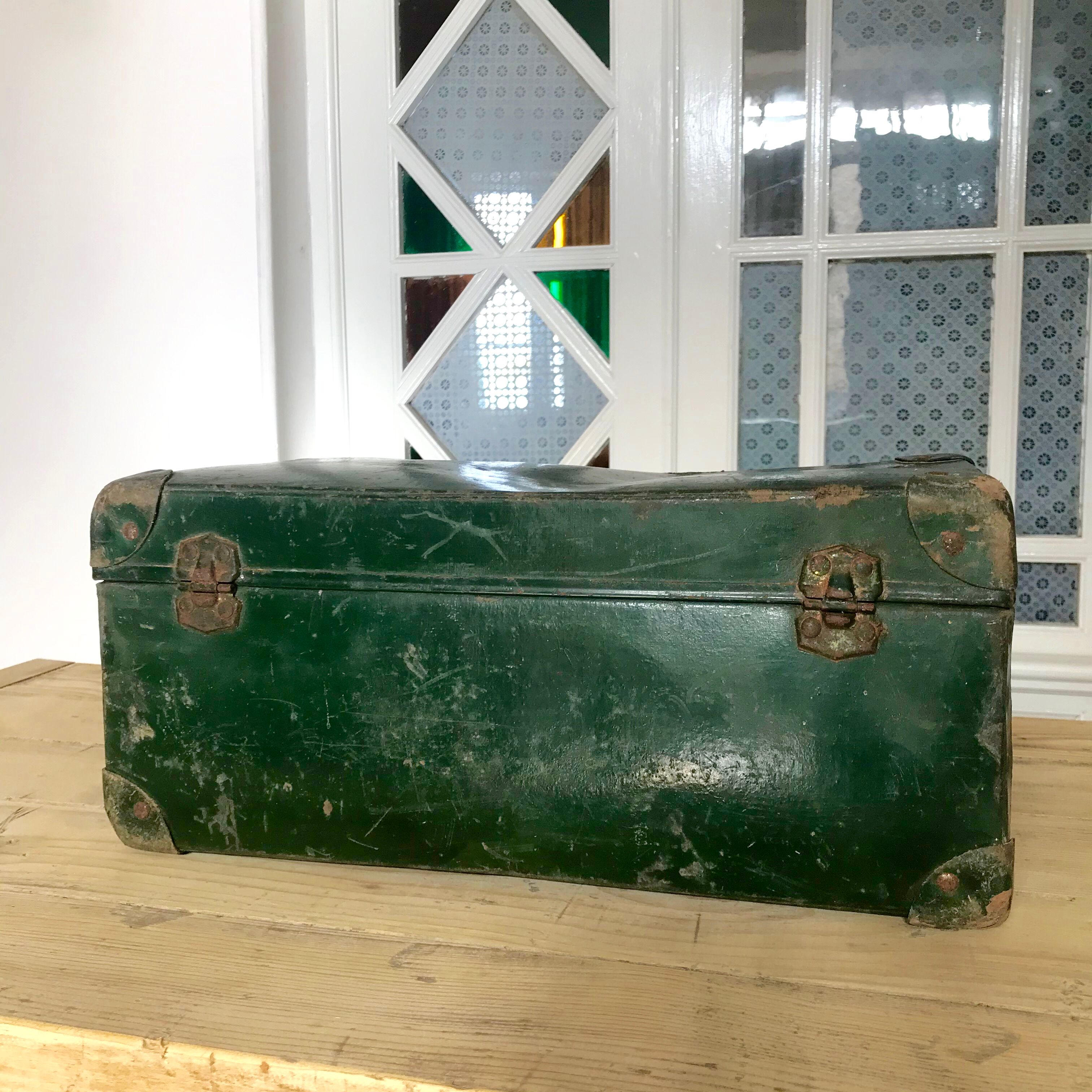 Valise verte vintage