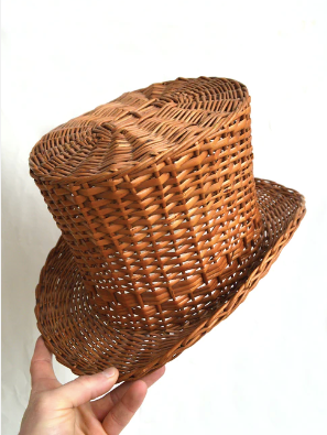 Top hat in rattan