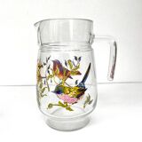 Vintage glass pitcher with birds