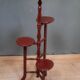 Porte pot en bois laqué rouge