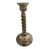 Twisted candlestick in gold metal
