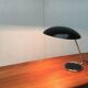 Metal table lamp model 6761 from the mid-century German period by Christian Dell for Kaiser Leuchten, 1960s.