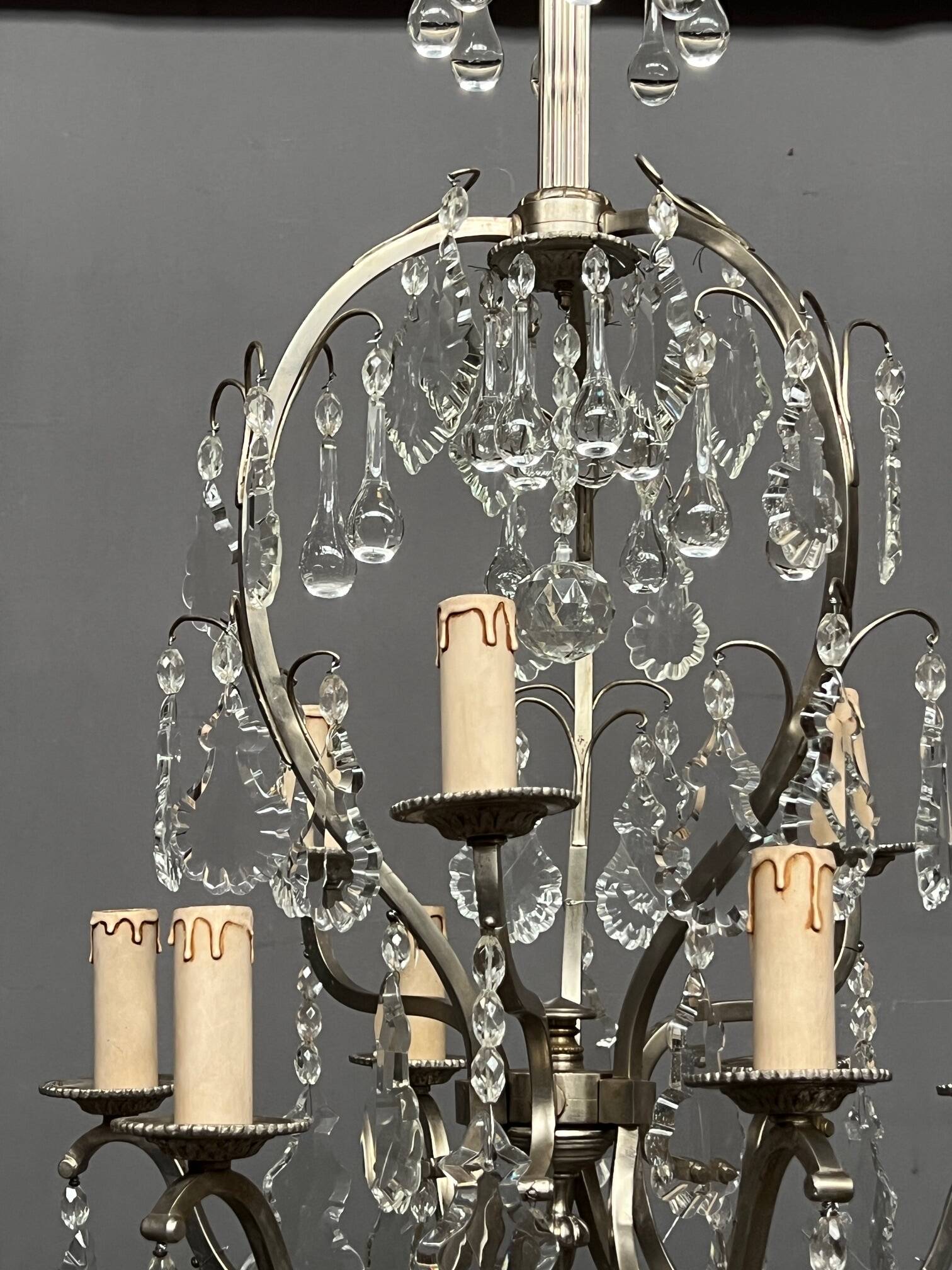 Rococo-style chandelier with 9 light arms.