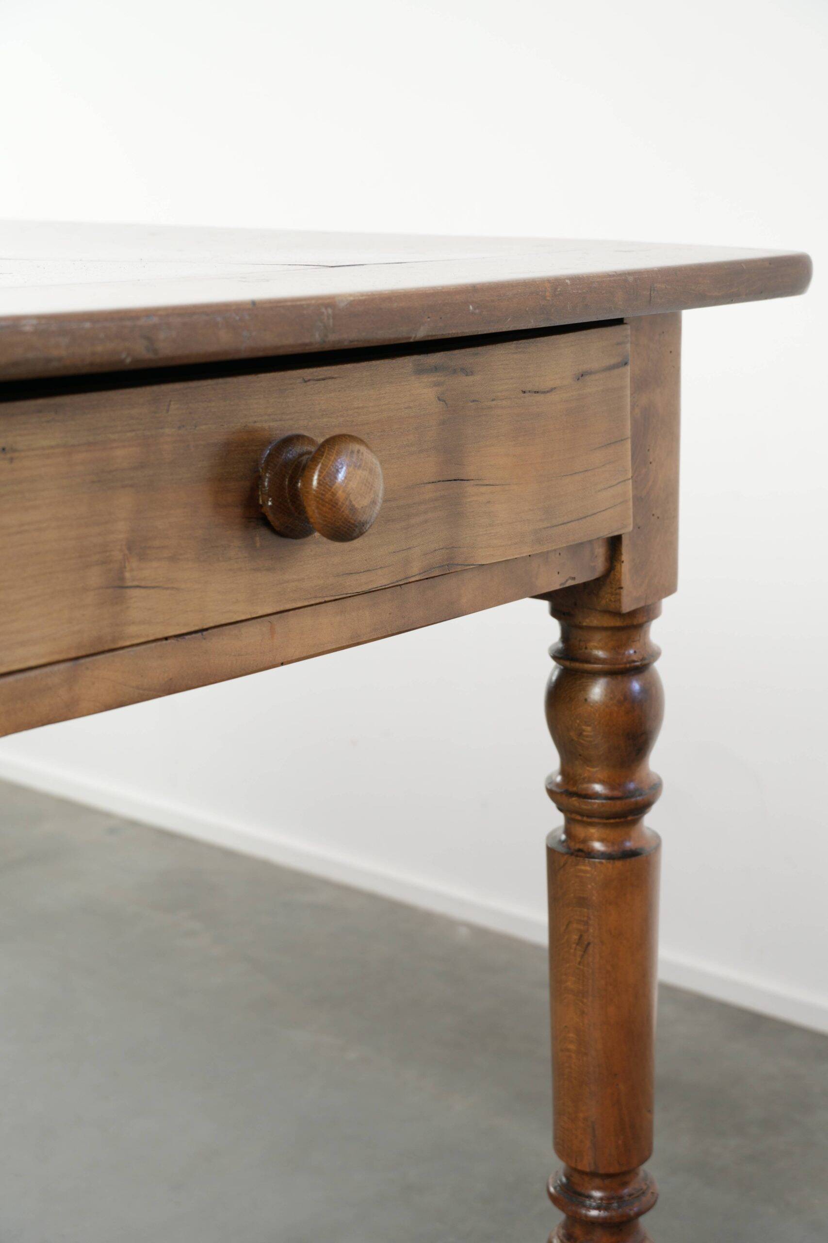 Antique French cherry wood dining table from the 19th century