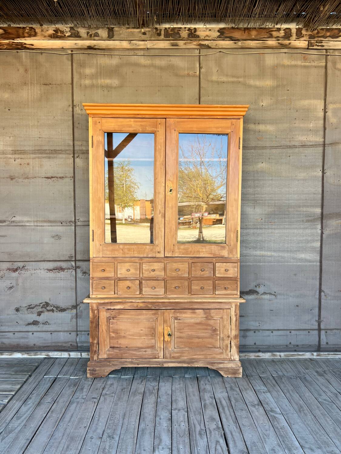 Old display cabinet in raw wood
