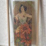 Mucha illustration on glass in a gilded frame