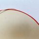 Pair of vintage round red plastic mirrors