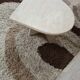 Travertine drop-shaped coffee table