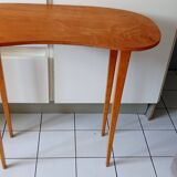 Scandinavian compass leg bean table