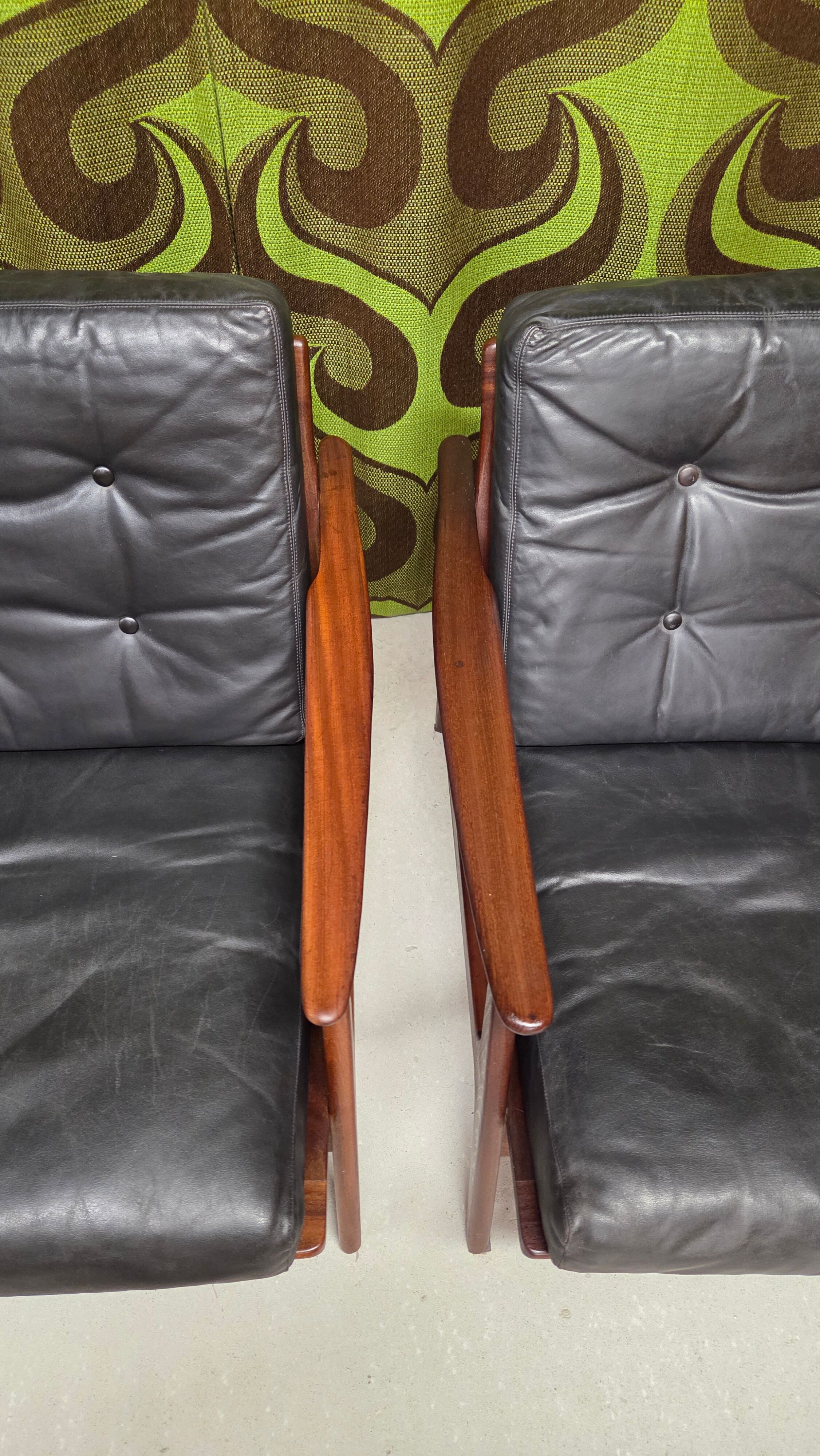 Pair of Scandinavian teak leather armchairs