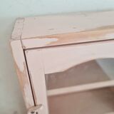 Medicine cabinet in patinated pink wood