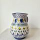 Vintage ceramic pitcher/vase hand-painted with floral decoration.