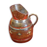 Wooden pitcher and vintage copper decoration