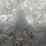 Antique round silver serving platter, grape motifs.