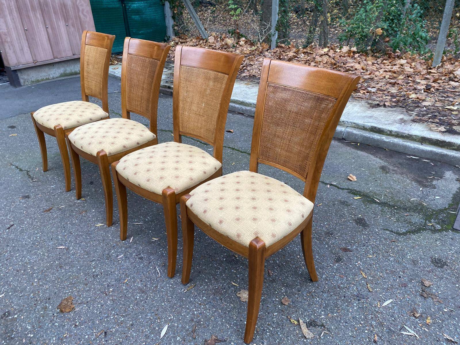 Four 20th-century Directoire-style chairs in solid wood with cane seats and beige fabric