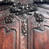 Armoire de mariage normande ancienne. Chêne sculpté.