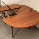 Scandinavian round teak dining table from the 60s extendable