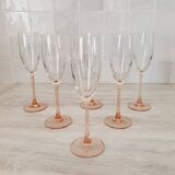 6 champagne flutes with pink stems