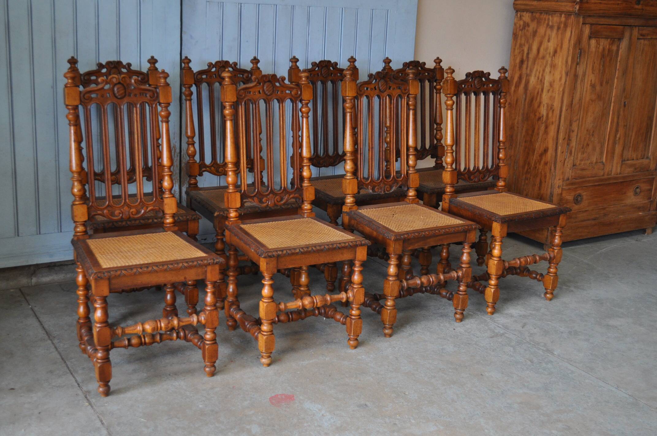 Set of 8 tanned chairs.