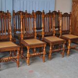 Set of 8 tanned chairs.