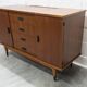 1960s teak sideboard with 4 drawers, 2 doors, and a mirror.
