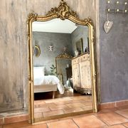 Antique gilded Louis XV pediment mirror
