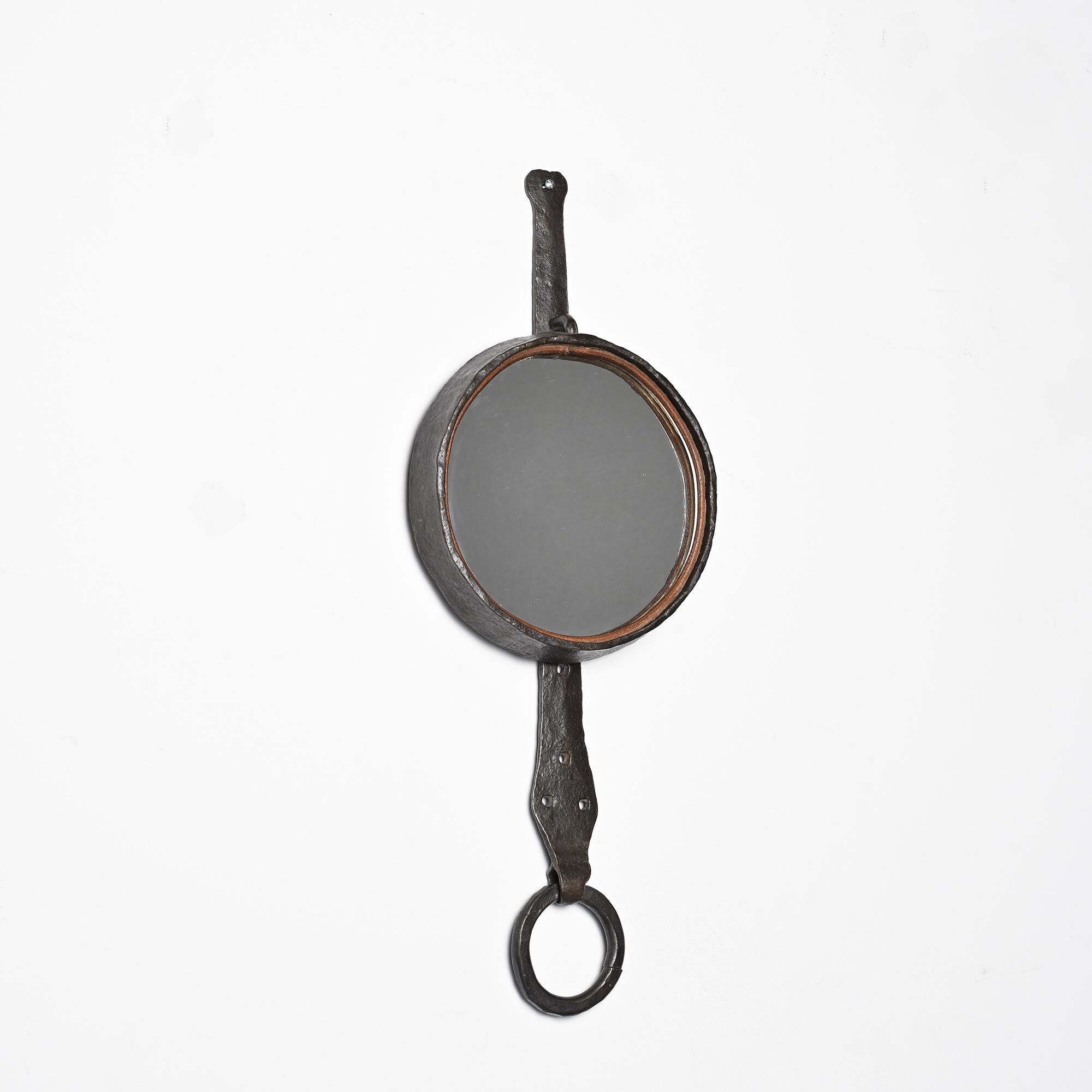 Wrought iron mirror by Léopold Gest, France, circa 1970.