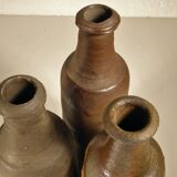 Lot de trois bouteilles anciennes en gres normand