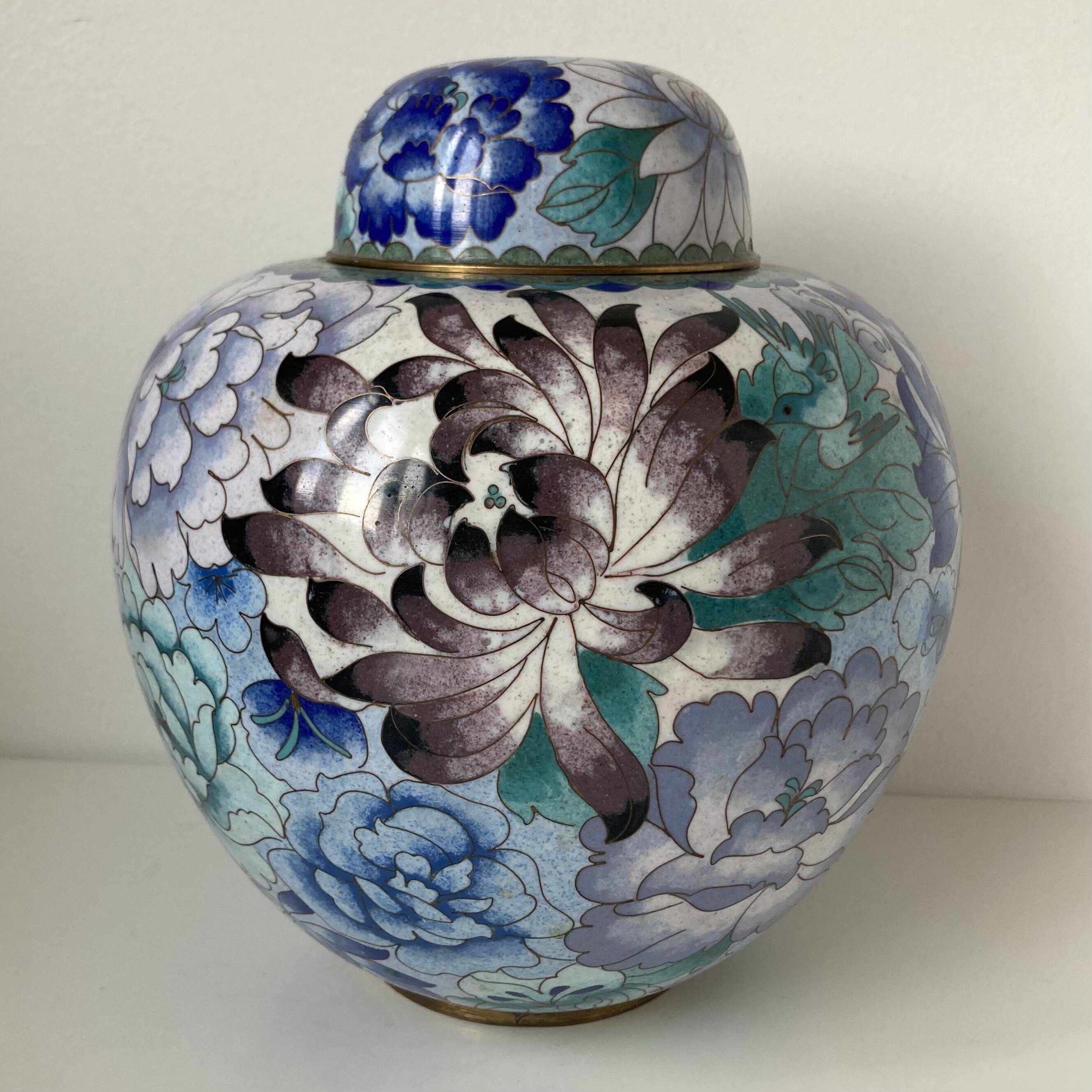 Chinese covered vase in copper alloy with polychrome cloisonné enamels featuring floral decoration.